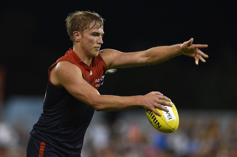 AFL 2016 Rd 07 - Gold Coast v Melbourne GOLD COAST, AUSTRALIA - MAY 7: Bernie Vince of the Demons looks to kick the ball during the 2016 AFL Round 07 match between the Gold Coast Suns and the Melbourne Demons at Metricon Stadium, Gold Coast on May 7, 2016. (Photo by Matt Roberts/AFL Media)